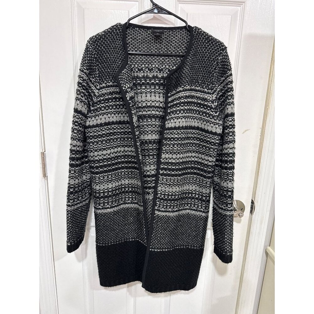 This is an Ann Taylor black and white striped cardigan sweater Size M